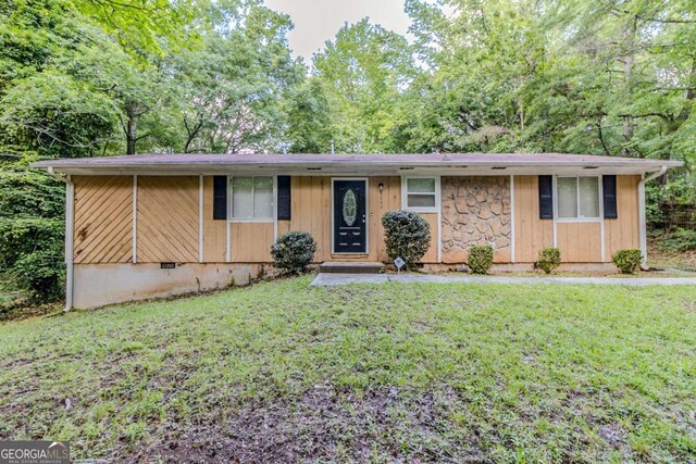 5509 Covent Way, Lithonia, GA 30058 - ranch-style house featuring a front lawn