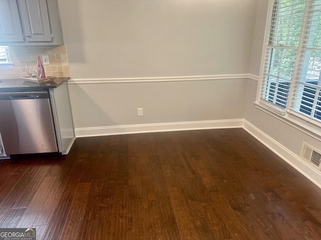 4790 Brandon Acres Ln, Buford, GA 30519 - unfurnished dining area featuring dark wood-style flooring and baseboards