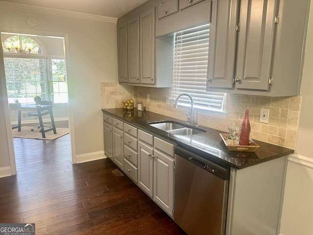 4790 Brandon Acres Ln, Buford, GA 30519 - kitchen featuring stainless steel dishwasher, a sink, tasteful backsplash, dark wood-style flooring, and crown molding