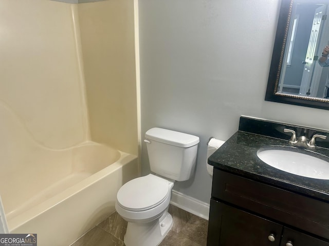 4790 Brandon Acres Ln, Buford, GA 30519 - full bathroom with toilet, baseboards, vanity, and  shower combination