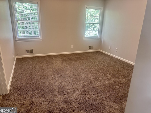 4790 Brandon Acres Ln, Buford, GA 30519 - spare room featuring carpet floors and baseboards