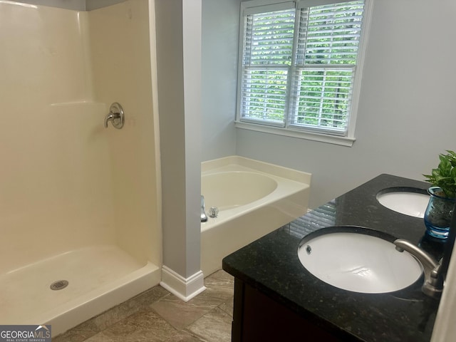 4790 Brandon Acres Ln, Buford, GA 30519 - bathroom with double vanity, a garden tub, and a stall shower