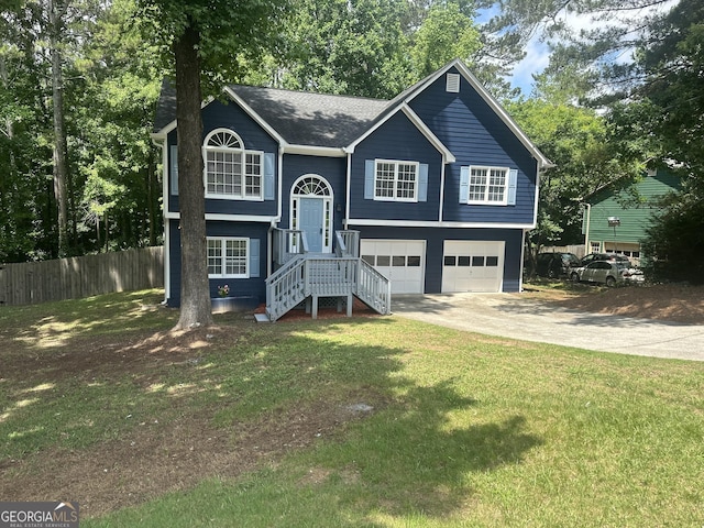 4790 Brandon Acres Ln, Buford, GA 30519 - bi-level home featuring driveway, a garage, a chimney, and a shingled roof