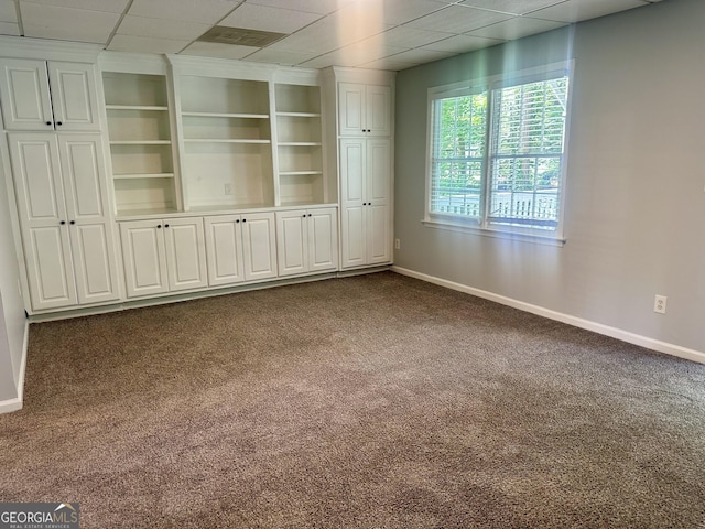 4790 Brandon Acres Ln, Buford, GA 30519 - spare room with dark carpet and a drop ceiling