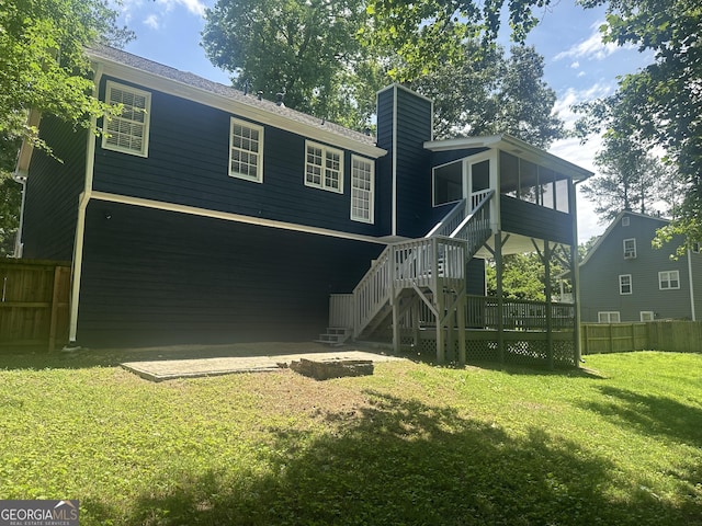 4790 Brandon Acres Ln, Buford, GA 30519 - back of house featuring stairs, a deck, a chimney, and a sunroom