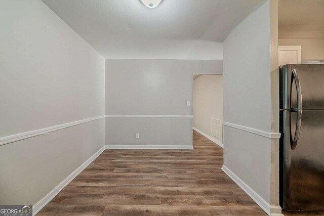 3731 Adkins Rd NW, Atlanta, GA 30331 - unfurnished dining area with wood finished floors and baseboards