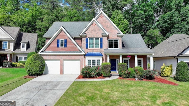 1095 S Bethany Creek Dr, Alpharetta, GA 30004 - view of front of home with driveway, a front yard, a garage, and brick siding