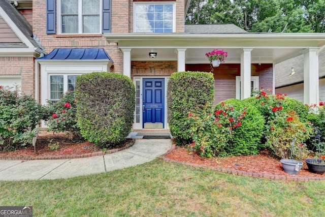 1095 S Bethany Creek Dr, Alpharetta, GA 30004 - view of exterior entry with brick siding and covered porch