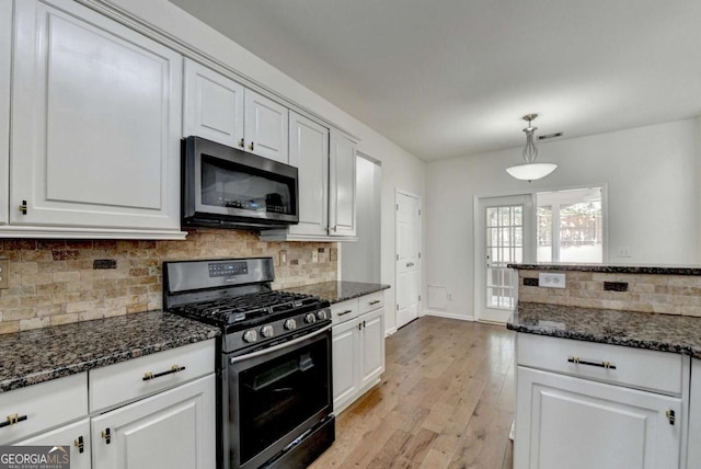 1095 S Bethany Creek Dr, Alpharetta, GA 30004 - kitchen featuring appliances with stainless steel finishes, light wood-style floors, white cabinetry, and tasteful backsplash