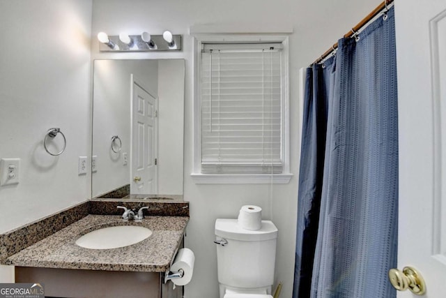 1095 S Bethany Creek Dr, Alpharetta, GA 30004 - bathroom with toilet, vanity, and curtained shower