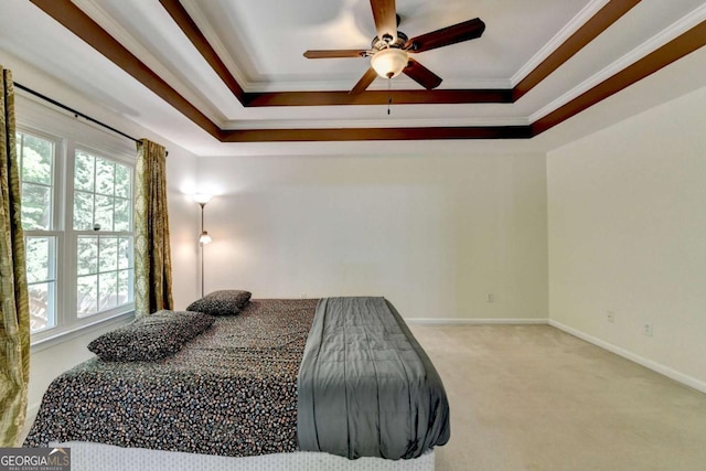 1095 S Bethany Creek Dr, Alpharetta, GA 30004 - carpeted bedroom with crown molding, multiple windows, a tray ceiling, baseboards, and a ceiling fan