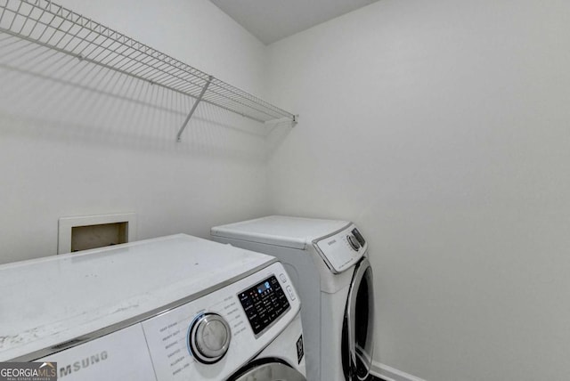 1095 S Bethany Creek Dr, Alpharetta, GA 30004 - laundry area with washing machine and clothes dryer and baseboards