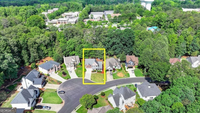 1095 S Bethany Creek Dr, Alpharetta, GA 30004 - view of property location with nearby suburban area, property boundaries highlighted, and a heavily wooded area