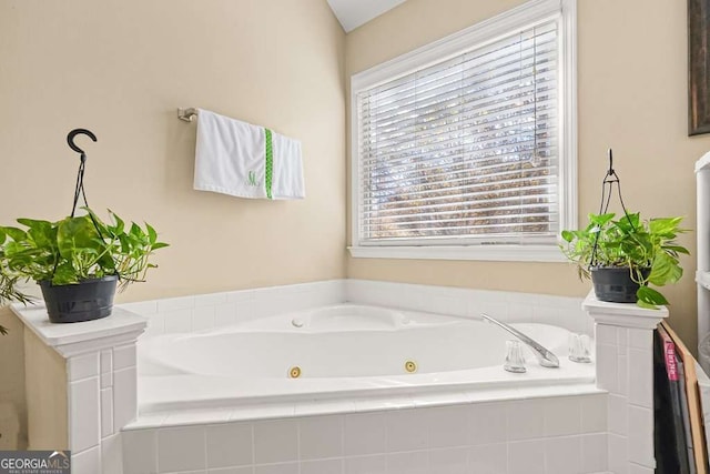bathroom with a whirlpool tub