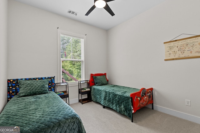 bedroom featuring baseboards, carpet, and a ceiling fan