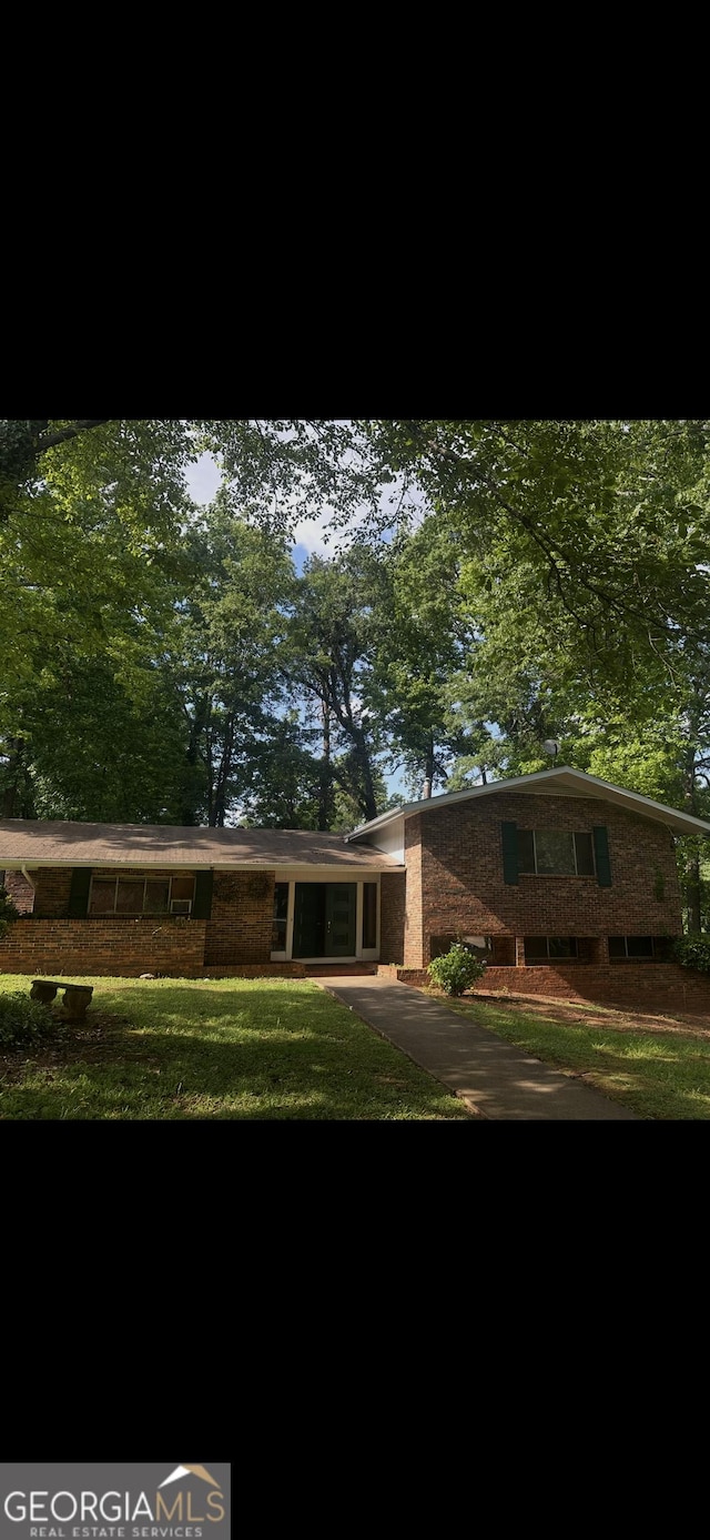 4516 Dorset Dr, Decatur, GA 30035 - view of front of property with brick siding and a front lawn