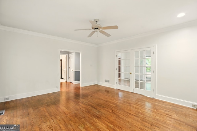 1256 Spring Park Dr SW, Atlanta, GA 30311 - unfurnished room featuring ornamental molding, ceiling fan, wood finished floors, and baseboards