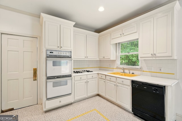1256 Spring Park Dr SW, Atlanta, GA 30311 - kitchen with white appliances, a sink, decorative backsplash, light countertops, and recessed lighting
