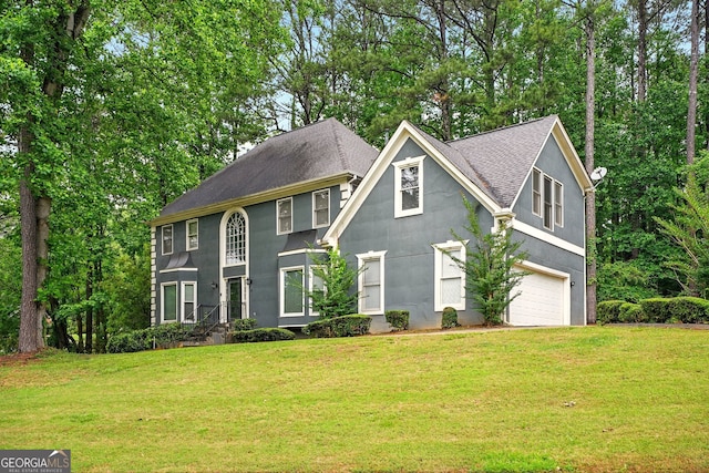 1256 Spring Park Dr SW, Atlanta, GA 30311 - colonial-style house with a shingled roof, an attached garage, and a front lawn