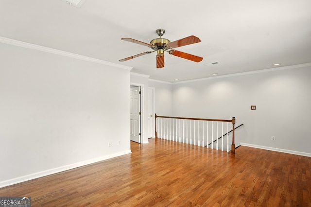 1256 Spring Park Dr SW, Atlanta, GA 30311 - unfurnished room with recessed lighting, baseboards, wood finished floors, ornamental molding, and ceiling fan
