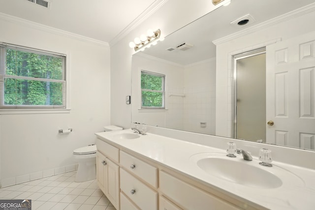 1256 Spring Park Dr SW, Atlanta, GA 30311 - bathroom featuring toilet, tile patterned floors, baseboards, double vanity, and ornamental molding