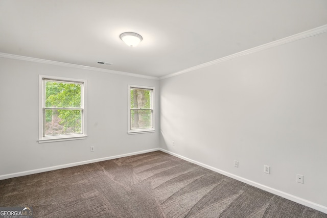 1256 Spring Park Dr SW, Atlanta, GA 30311 - spare room featuring crown molding, baseboards, and dark carpet