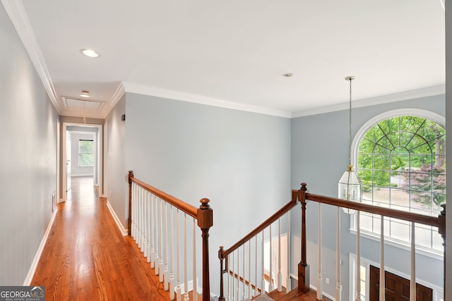 1256 Spring Park Dr SW, Atlanta, GA 30311 - hallway with attic access, an upstairs landing, wood finished floors, baseboards, and ornamental molding