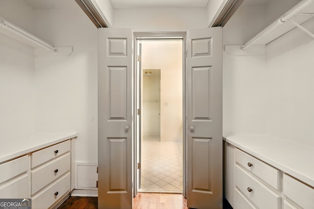 1256 Spring Park Dr SW, Atlanta, GA 30311 - spacious closet featuring dark wood-style floors