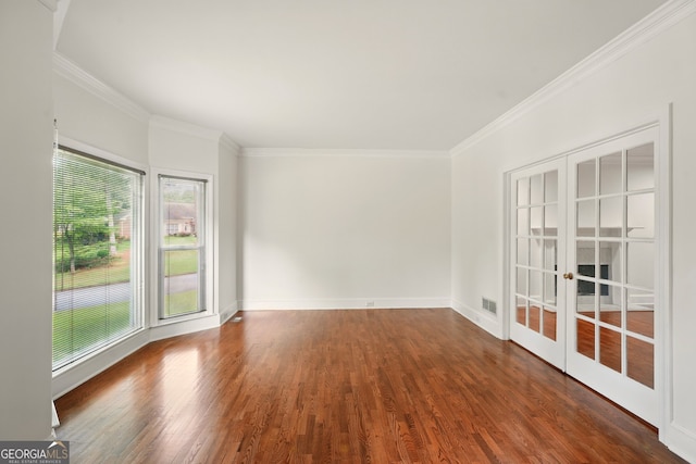 1256 Spring Park Dr SW, Atlanta, GA 30311 - unfurnished room with french doors, crown molding, wood finished floors, and baseboards