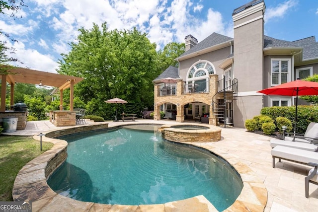 view of pool with a patio, a pergola, stairway, and a pool with connected hot tub