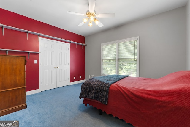 604 Clearwater Ct, Mcdonough, GA 30252 - carpeted bedroom with a ceiling fan and a closet