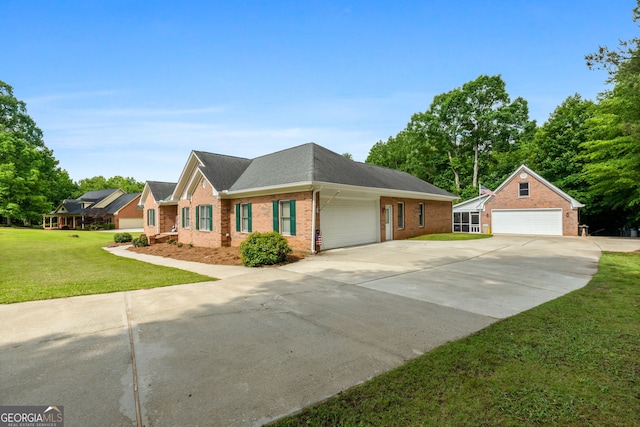 604 Clearwater Ct, Mcdonough, GA 30252 - view of front of property with brick siding, a front lawn, a shingled roof, and driveway