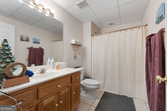 604 Clearwater Ct, Mcdonough, GA 30252 - bathroom with a drop ceiling, tile patterned floors, vanity, and curtained shower