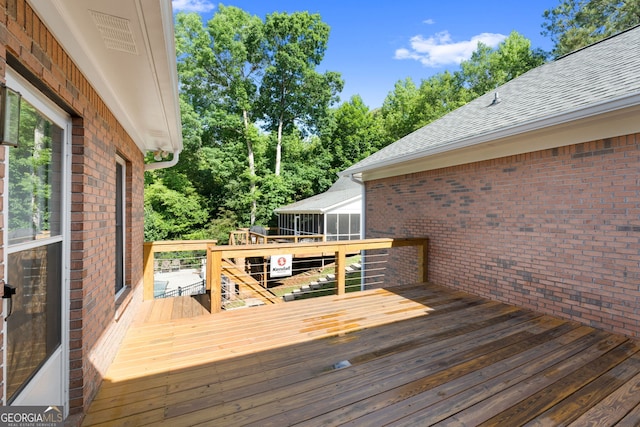 604 Clearwater Ct, Mcdonough, GA 30252 - wooden terrace featuring view of scattered trees and a sunroom