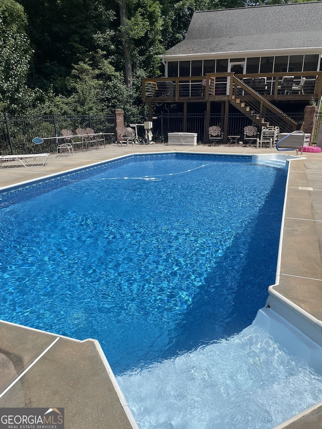 604 Clearwater Ct, Mcdonough, GA 30252 - view of swimming pool featuring stairway and a patio area