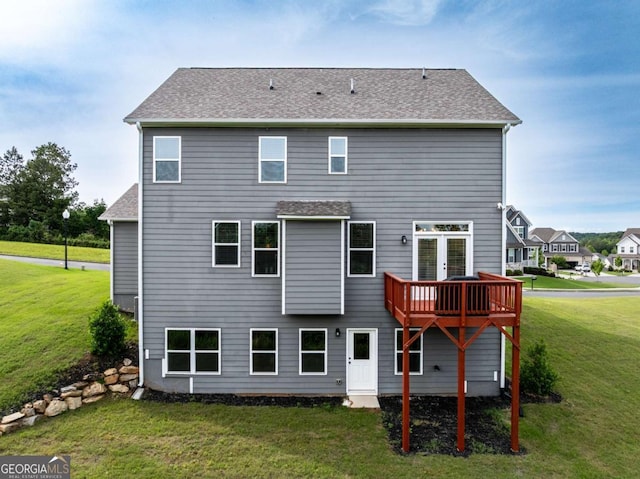 17 Ridgeline Way NW, Cartersville, GA 30121 - back of property with a lawn, a deck, and roof with shingles