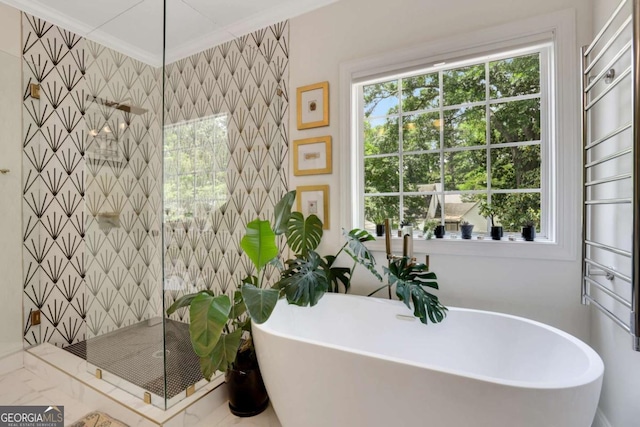 47 Roseclair Dr SE, Atlanta, GA 30317 - full bath featuring a stall shower, a freestanding tub, and crown molding