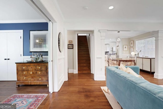 47 Roseclair Dr SE, Atlanta, GA 30317 - living area with stairway, wood finished floors, ornamental molding, and recessed lighting