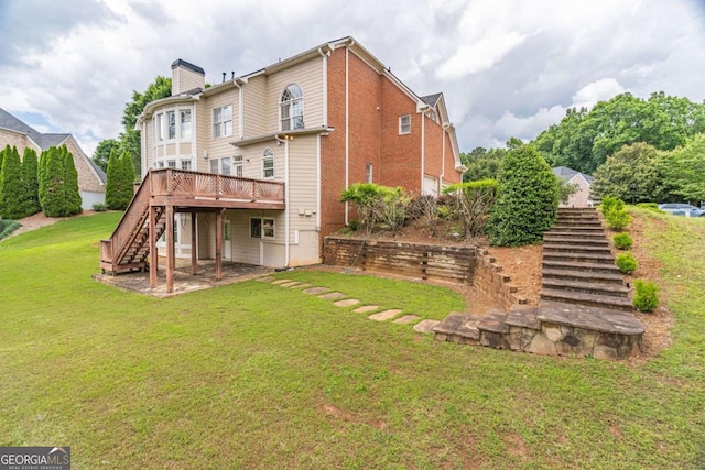 rear view of house with stairway, a wooden deck, a chimney, and a yard