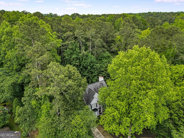 drone / aerial view of a heavily wooded area