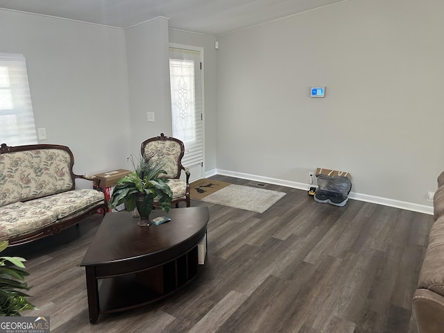 104 N Stewart Ln, Griffin, GA 30224 - living area with dark wood-style floors and baseboards