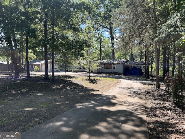 104 N Stewart Ln, Griffin, GA 30224 - view of yard featuring concrete driveway