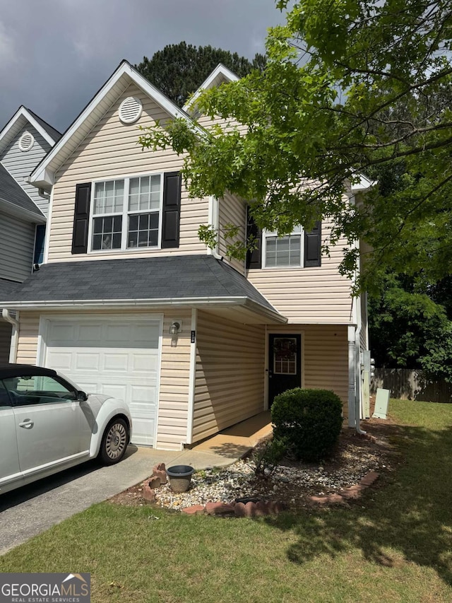 traditional-style home featuring a garage