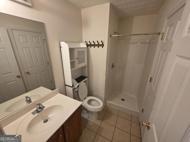 4015 Hidden Hollow Dr, Gainesville, GA 30506 - full bath featuring a textured ceiling, a shower, toilet, tile patterned floors, and vanity