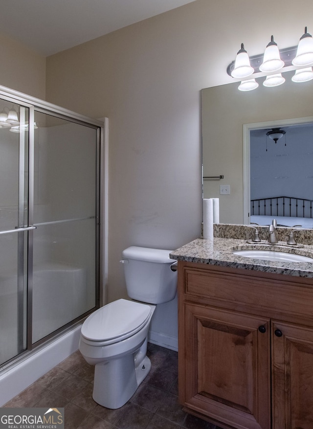375 Luther Bailey Rd, Senoia, GA 30276 - full bathroom with toilet, a shower stall, vanity, and tile patterned flooring