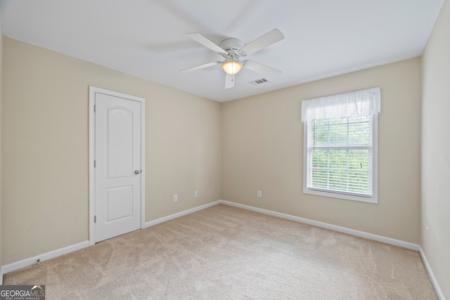 924 Vinings Dr, Winder, GA 30680 - empty room with carpet, a ceiling fan, and baseboards