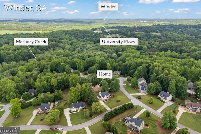924 Vinings Dr, Winder, GA 30680 - bird's eye view of a heavily wooded area