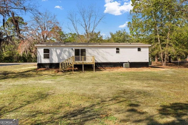 view of outbuilding with central AC unit and stairway