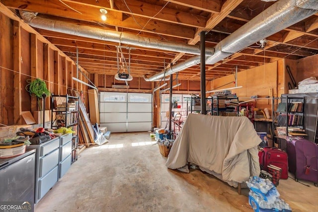 garage featuring a garage door opener