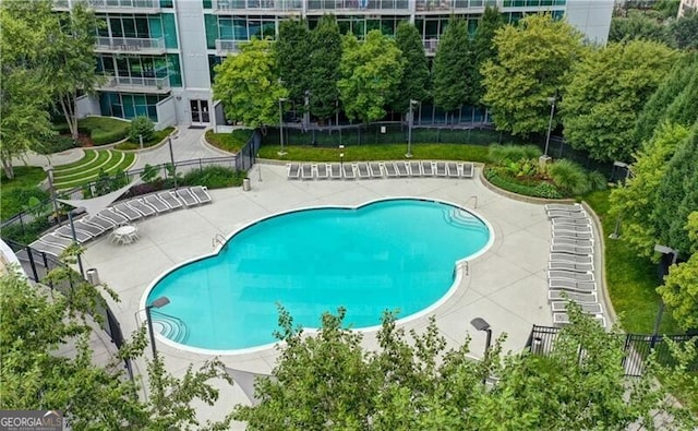 950 W Peachtree St NW Unit 1613, Atlanta, GA 30309 - community pool featuring a patio